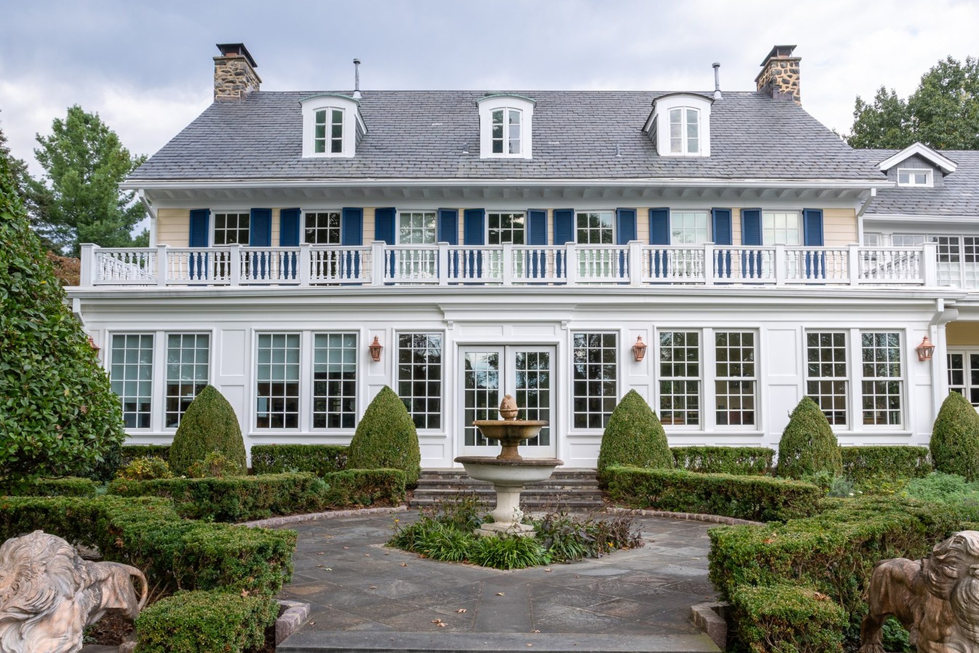 North Wind project in Ruxton, Maryland — front of the home with courtyard fountain by Samuel Adams & Company (photo: Austin Green)