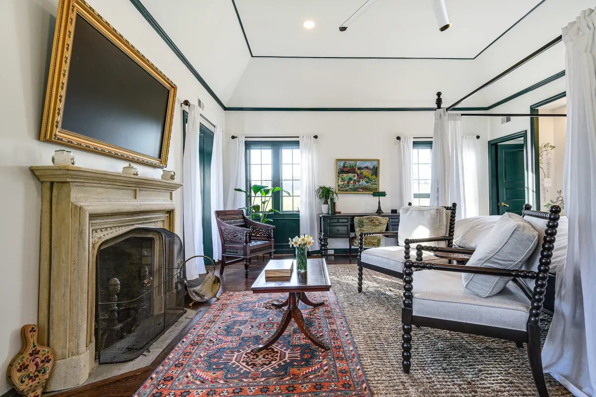 Master bedroom from fireplace showing full room depth and mural — Hunt Valley
